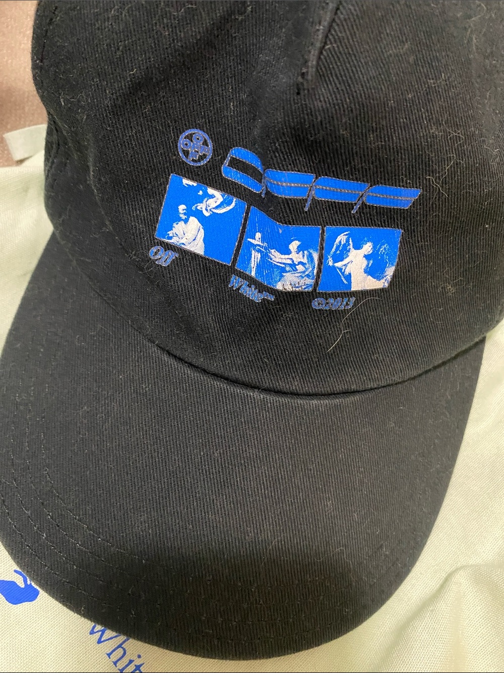 Off-White Black Baseball Cap with White Label and Striped Tag used condition